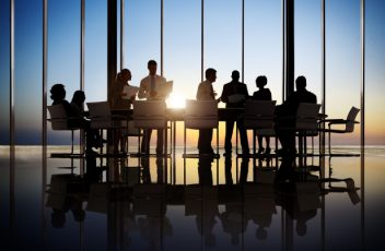 Business people working in a conference room.